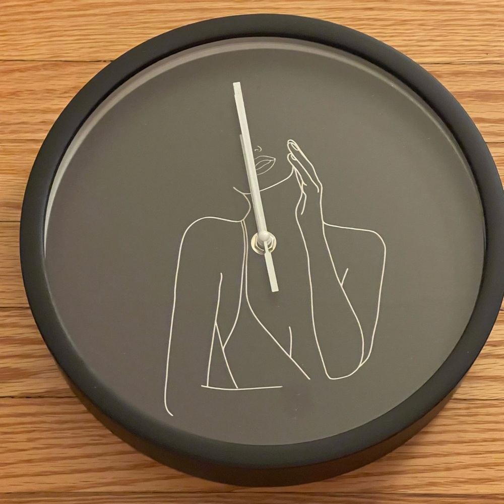 Urban outfitters women sketch wall clock